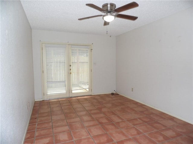 13656 Teague Ln Unit 33, Corpus Christi, TX 78410 - spare room featuring french doors, a ceiling fan, and a textured ceiling
