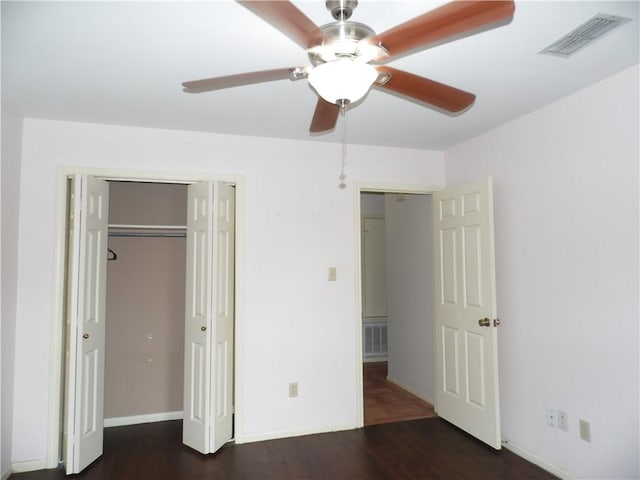 13656 Teague Ln Unit 33, Corpus Christi, TX 78410 - unfurnished bedroom with wood finished floors, a ceiling fan, baseboards, and a closet