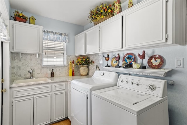 16025 Cuttysark St, Corpus Christi, TX 78418 - washroom featuring washer and dryer, a sink, and cabinet space