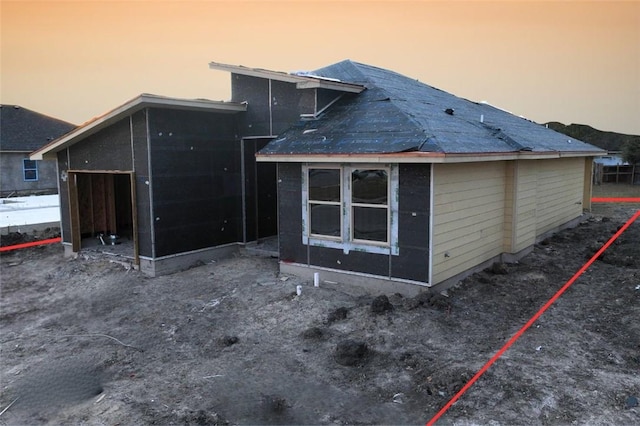 view of property exterior at dusk