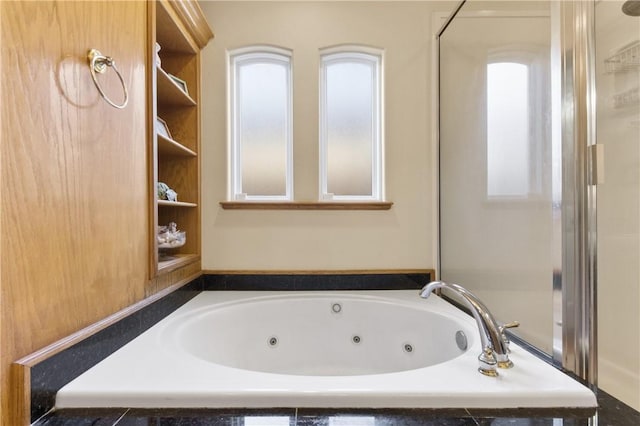 13805 Hawksnest Bay Dr, Corpus Christi, TX 78418 - full bathroom with a tub with jets and a shower