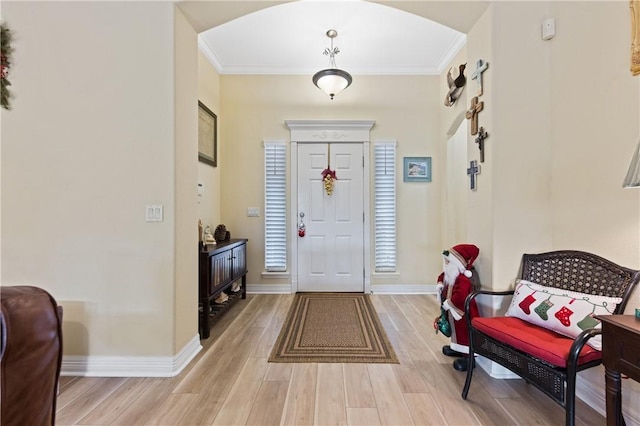 13805 Hawksnest Bay Dr, Corpus Christi, TX 78418 - entrance foyer with ornamental molding and light wood-style flooring
