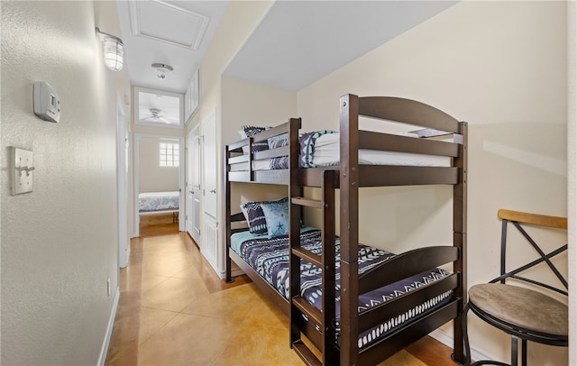 2212 State Highway 361, Port Aransas, TX 78373 - tiled bedroom featuring baseboards