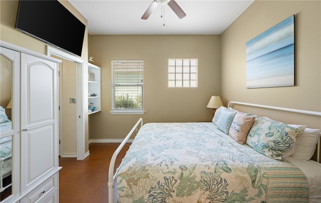 2212 State Highway 361, Port Aransas, TX 78373 - bedroom with baseboards and a ceiling fan