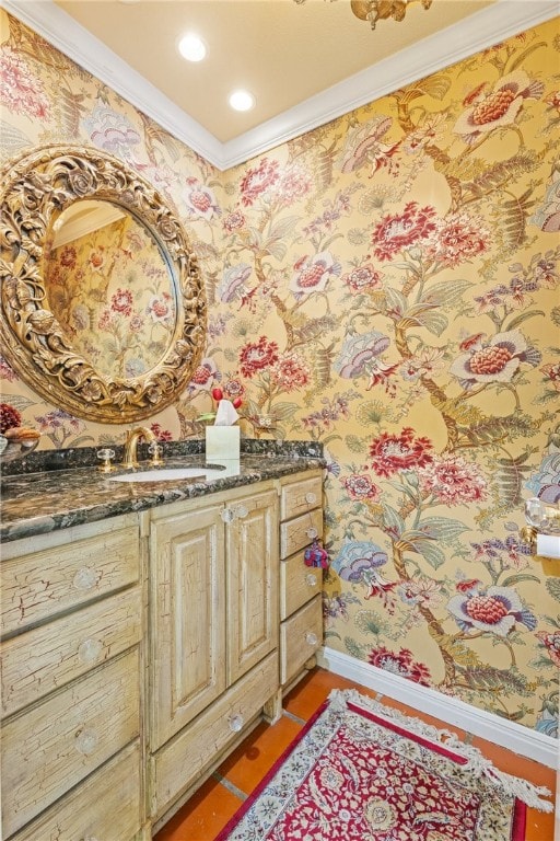 bathroom with vanity, recessed lighting, baseboards, wood finished floors, and ornamental molding