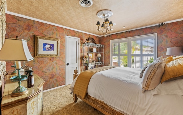 bedroom featuring wallpapered walls, a chandelier, ornamental molding, and visible vents
