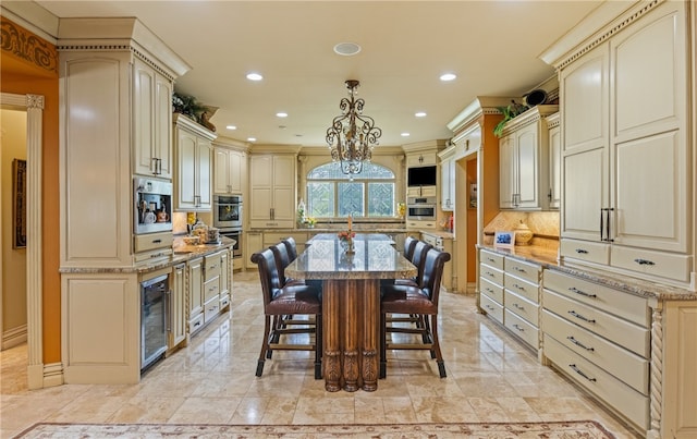 dining space with recessed lighting and wine cooler