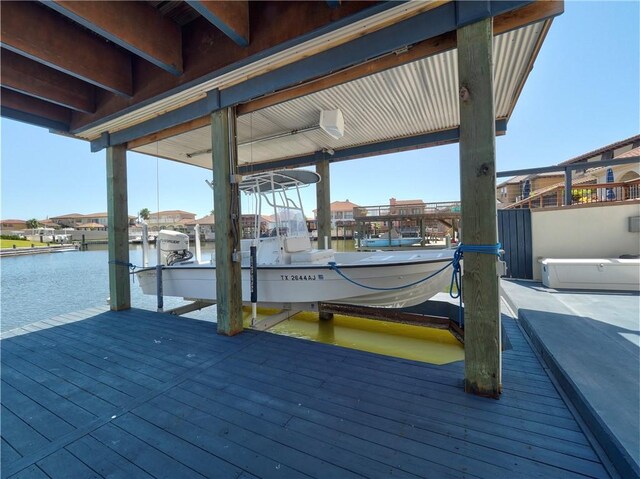 13834 Captains Row, Corpus Christi, TX 78418 - dock featuring boat lift and a water view