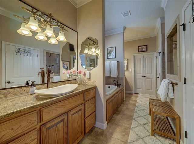 13834 Captains Row, Corpus Christi, TX 78418 - bathroom featuring a chandelier, crown molding, a bath, vanity, and tile patterned flooring