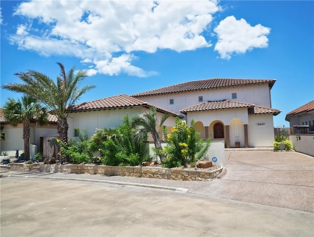 13834 Captains Row, Corpus Christi, TX 78418 - mediterranean / spanish house with driveway and stucco siding