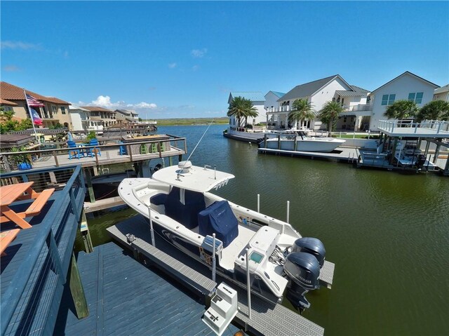 13834 Captains Row, Corpus Christi, TX 78418 - dock featuring boat lift, a water view, and a residential view