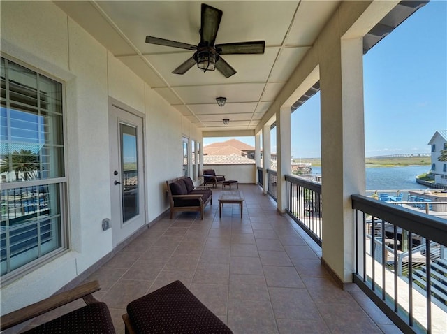 13834 Captains Row, Corpus Christi, TX 78418 - balcony with a water view and a ceiling fan