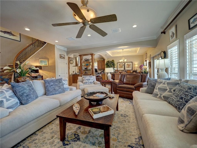 13834 Captains Row, Corpus Christi, TX 78418 - living area featuring decorative columns, arched walkways, stairs, ceiling fan, and ornamental molding