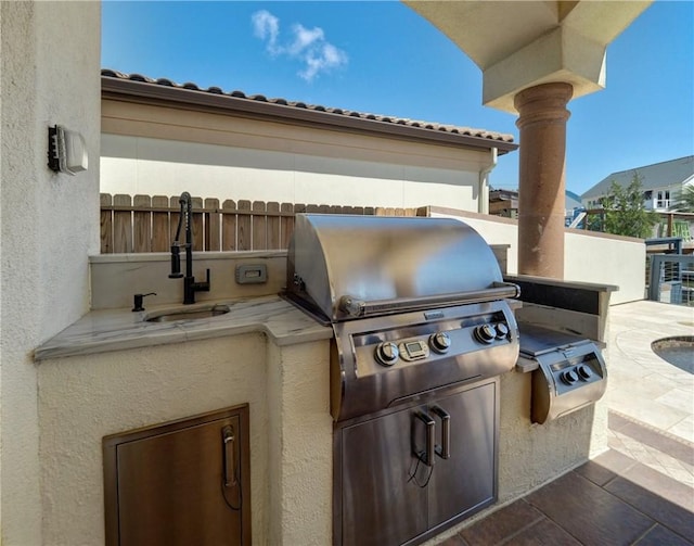 13834 Captains Row, Corpus Christi, TX 78418 - view of patio with exterior kitchen and a sink