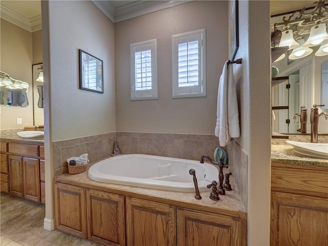 13834 Captains Row, Corpus Christi, TX 78418 - full bath featuring two vanities, a garden tub, and ornamental molding