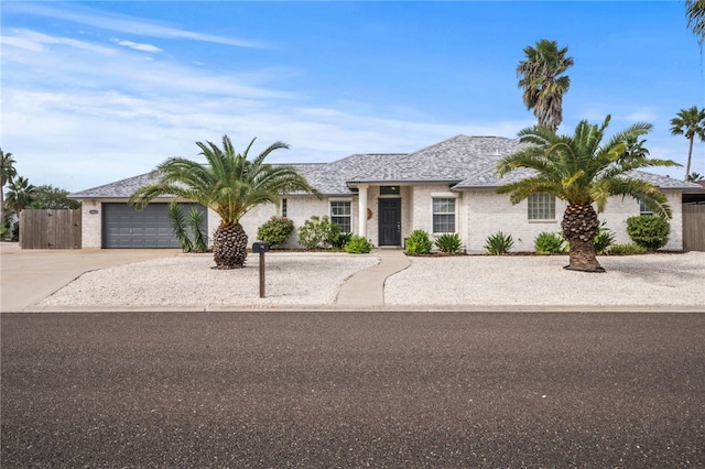 ranch-style home with a garage