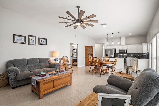 living room featuring ceiling fan