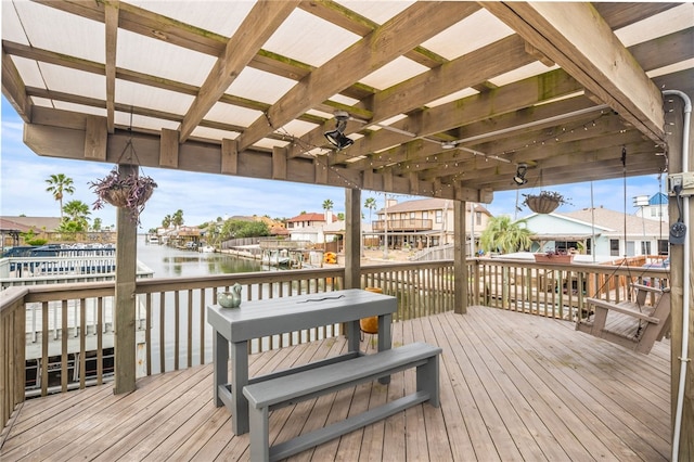 wooden terrace with a water view