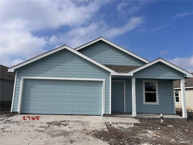 view of front of home with a garage