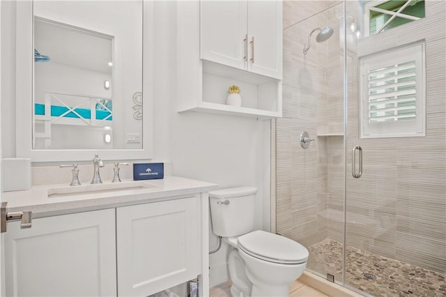 288 Hide Away Dr, Port Aransas, TX 78373 - bathroom with a shower stall, toilet, and vanity