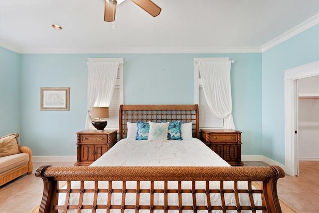 tiled bedroom with ceiling fan and ornamental molding