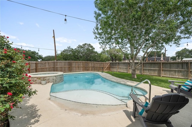 116 James Dr, Sinton, TX 78387 - view of pool featuring a fenced backyard, a pool with connected hot tub, and a patio