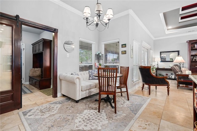 116 James Dr, Sinton, TX 78387 - living area featuring crown molding, a chandelier, a barn door, and baseboards
