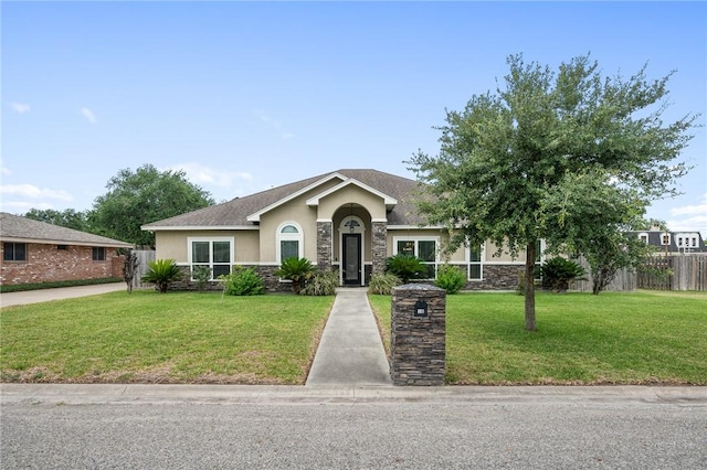 116 James Dr, Sinton, TX 78387 - view of front of house with stucco siding and stone siding