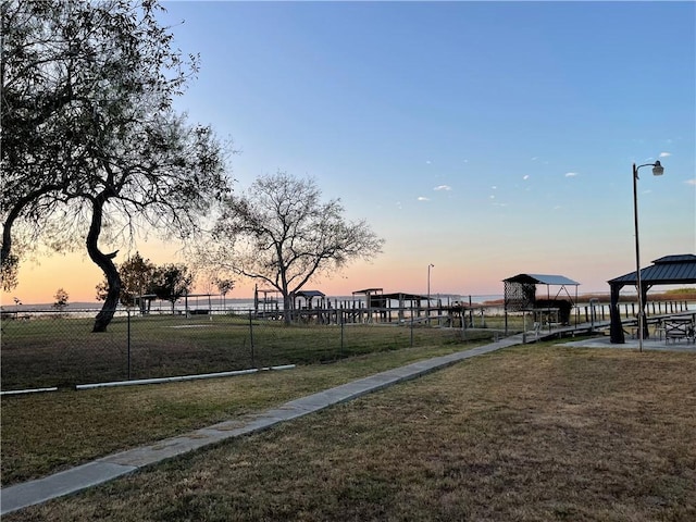 view of community with a gazebo and a lawn