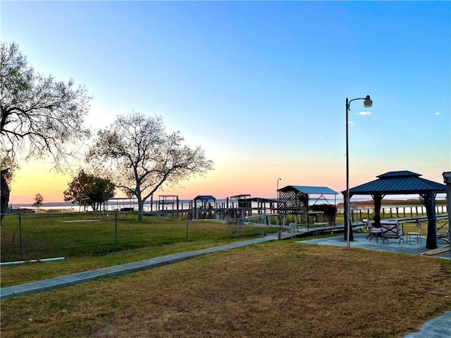 view of community with a gazebo and a lawn