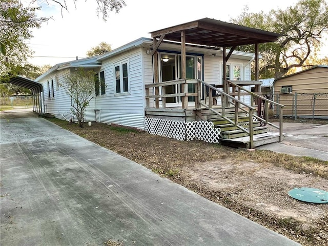 view of front of house featuring a carport