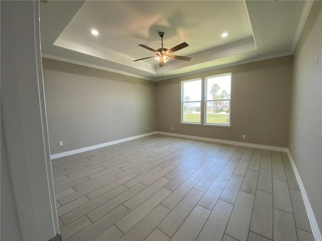 13941 Flintlock Dr, Corpus Christi, TX 78418 - empty room with a tray ceiling, a ceiling fan, recessed lighting, light wood-style flooring, and ornamental molding
