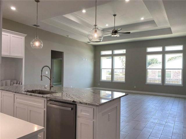 13941 Flintlock Dr, Corpus Christi, TX 78418 - kitchen with stainless steel dishwasher, a raised ceiling, open floor plan, ceiling fan, and recessed lighting