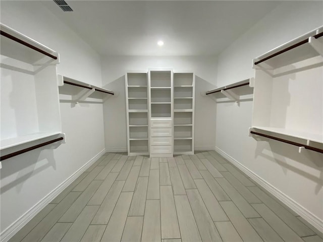 13941 Flintlock Dr, Corpus Christi, TX 78418 - spacious closet with wood finished floors