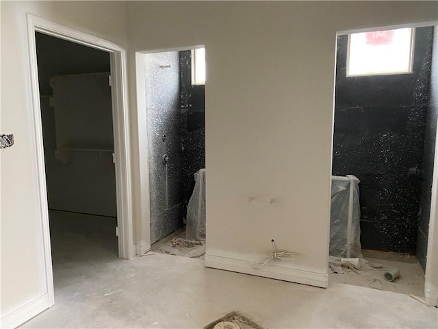 bathroom featuring concrete floors