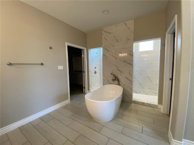 13941 Flintlock Dr, Corpus Christi, TX 78418 - bathroom with a freestanding tub and a walk in shower