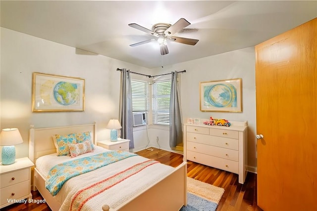 bedroom with ceiling fan and dark wood-type flooring