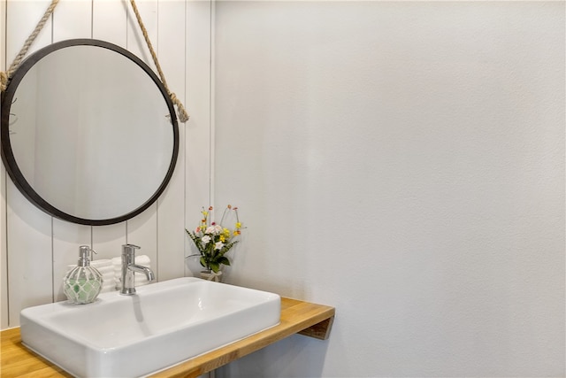 bathroom with sink and hardwood / wood-style flooring