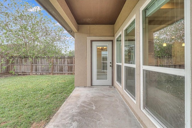 exterior space with a yard and a patio area