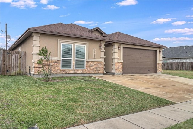 prairie-style home with a garage and a front yard