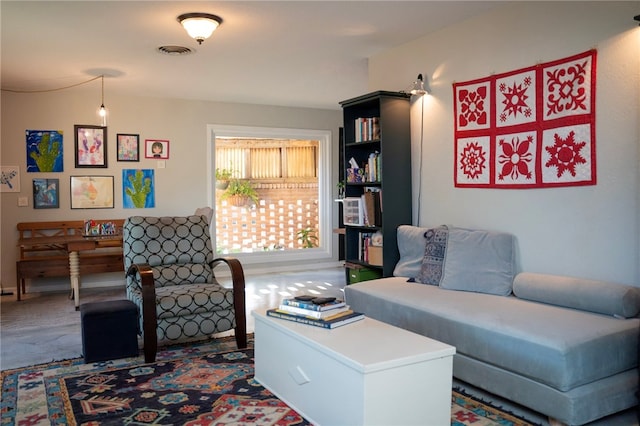 living room featuring visible vents