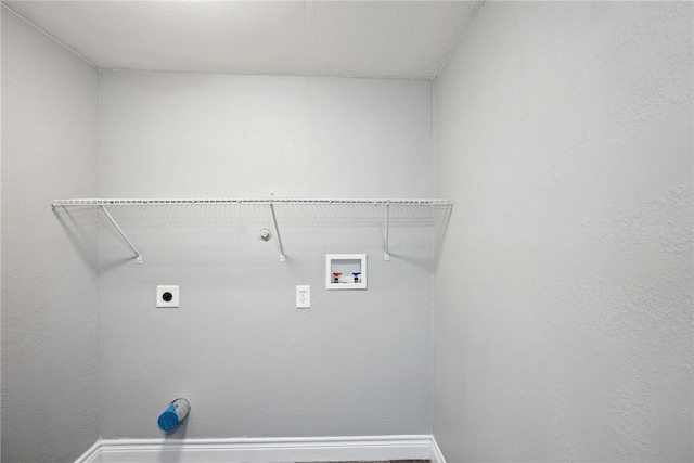 washroom with hookup for an electric dryer and washer hookup