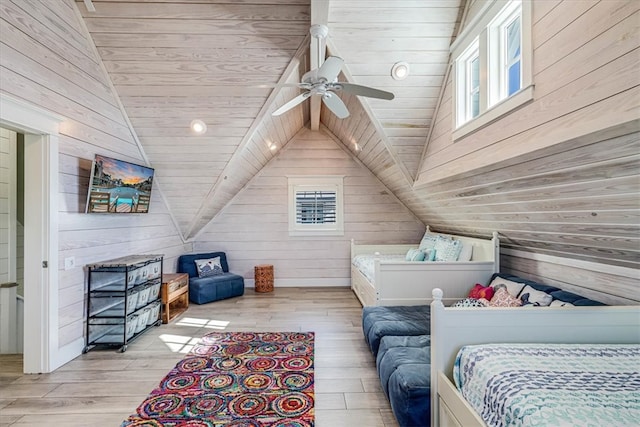 bedroom with wood walls, wood ceiling, vaulted ceiling, and wood finished floors