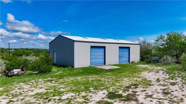 view of outdoor structure with a garage