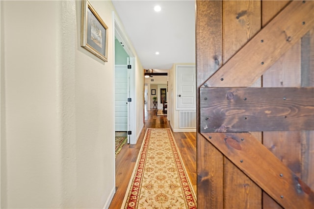 hall featuring hardwood / wood-style flooring