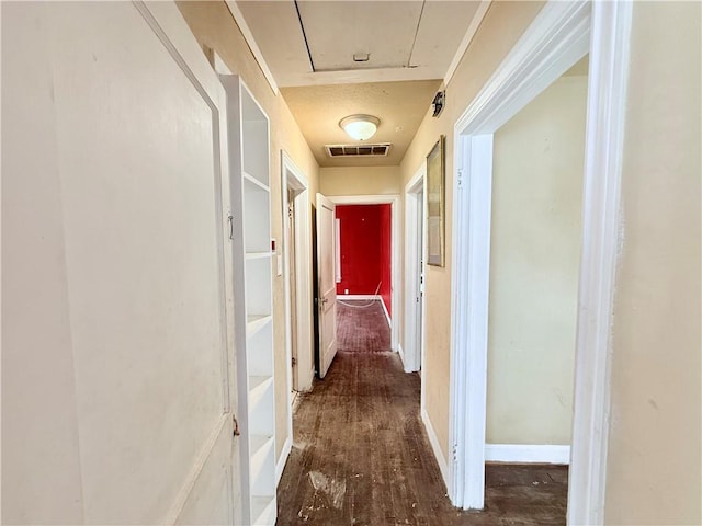 hall featuring visible vents