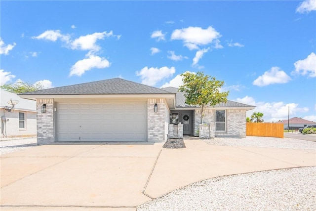 13948 Lighthouse Dr, Corpus Christi, TX 78418 - ranch-style house with driveway, a garage, and brick siding