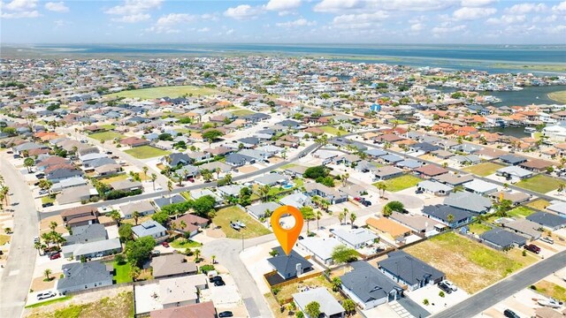 13948 Lighthouse Dr, Corpus Christi, TX 78418 - aerial view of property and surrounding area featuring a nearby body of water and nearby suburban area