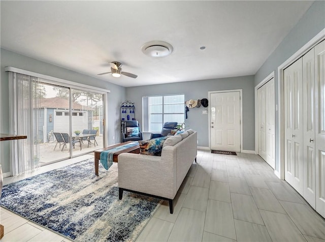 living room with ceiling fan