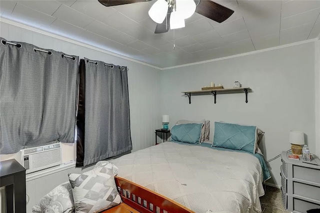 bedroom featuring crown molding, cooling unit, and ceiling fan